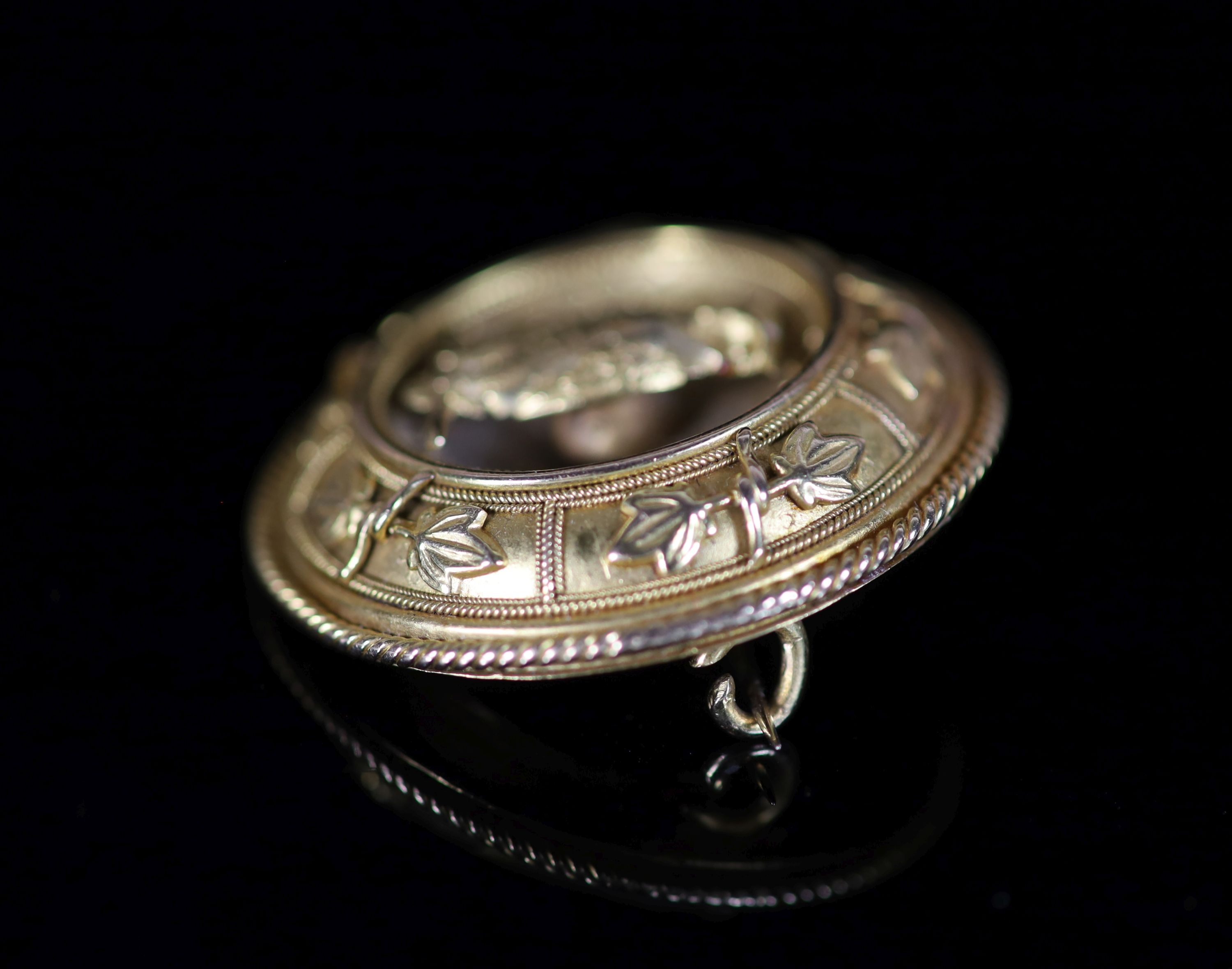 A Victorian gold target brooch